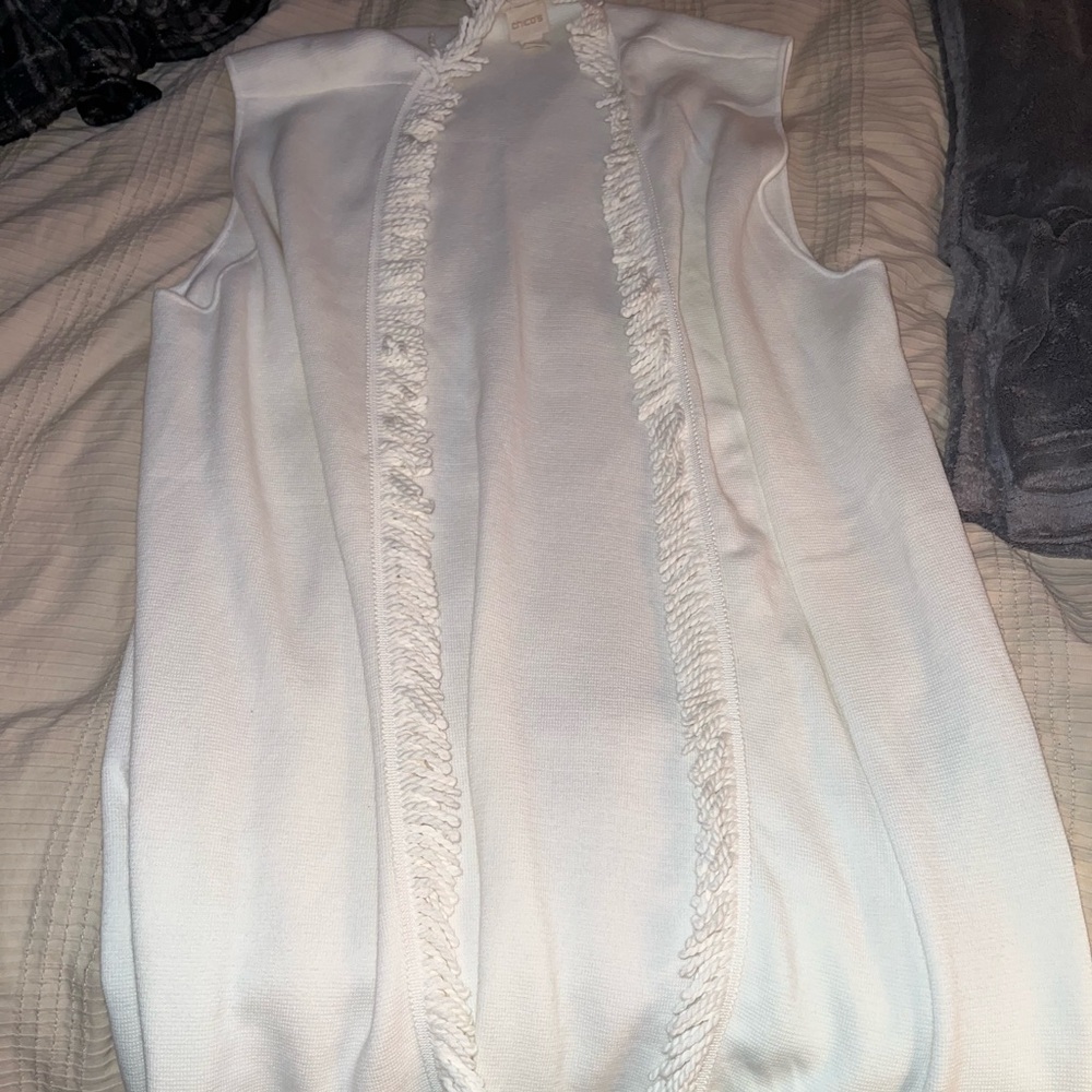 white sleeveless cardigan